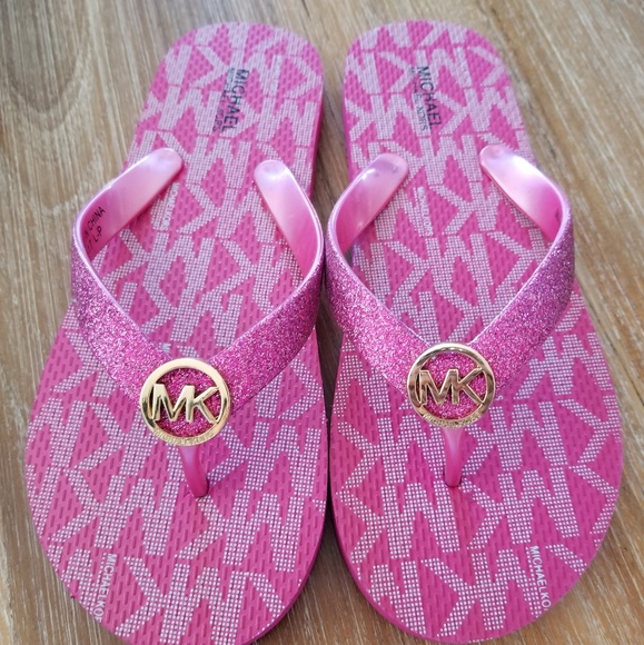 Michael Kors Shoes - Michael Kors size 5 pink glitter emblem sandals